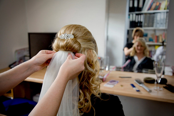 Putting on the Wedding Veil - wedding Photographer Bristol and Leicestershire