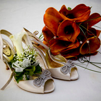Bride's Shoes and Flowers Wedding Photographers Bristol and  Leicester