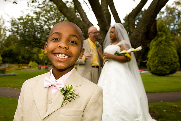 As Mum and Dad get married thire son is as proud as punch